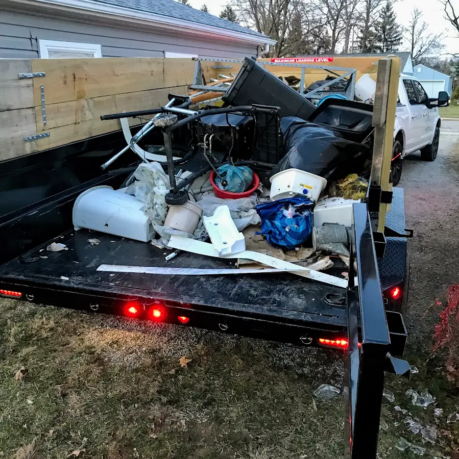 Roll-off dumpster delivered to a residential driveway in Spanish Fork