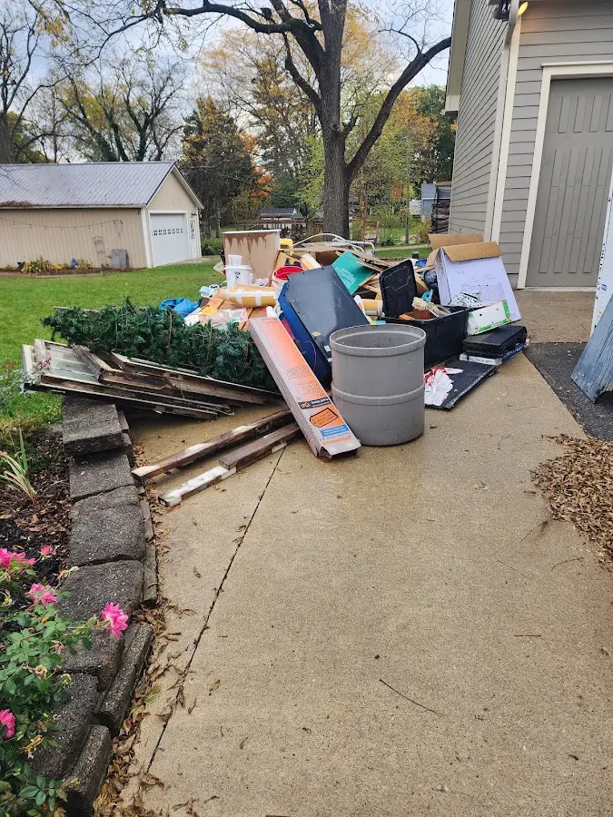 Dumpster being loaded with debris for 30 Yard Dumpster Rental in Spanish Fork